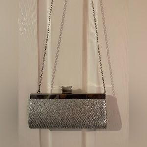 Silver clutch purse with chain
